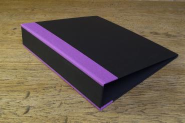 black folder with purple linen corners